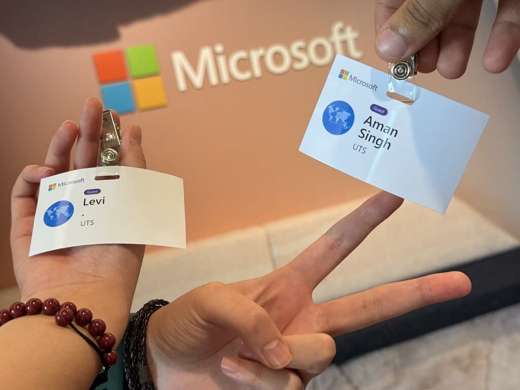 Microsoft guest badges for Levi and Aman Singh at the EduX Hackathon.